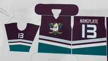 Load image into Gallery viewer, Custom printed sports jersey template or flat lay mockup on a white background, featuring a dark purple body with teal and white stripes, a custom logo, and the number 13.
